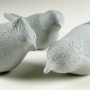 Unfired pottery bird sculptures by Carrie Wolf